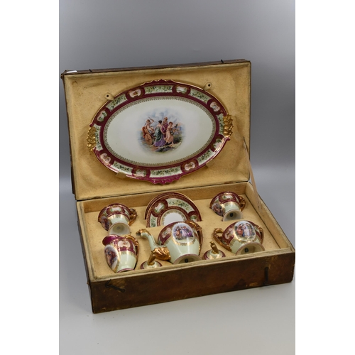 316 - Royal Vienna Tete-a-tete 19th Century Porcelain Tea Set finished in Burgundy and Gilt with Beehive m... 