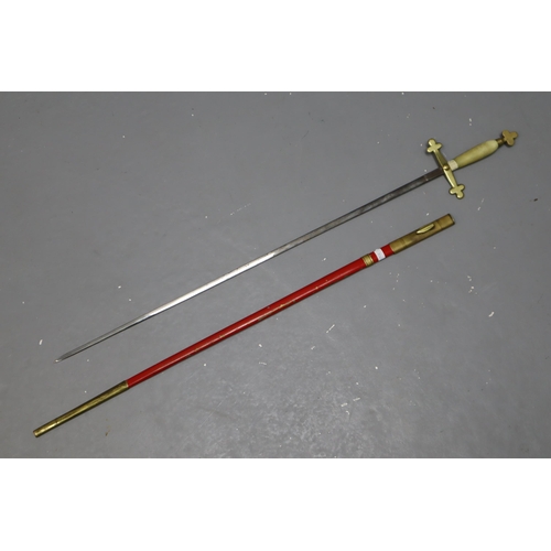 317 - Gilt Sword with Cross Shaped Handle & white Grip and Red Sheath (34