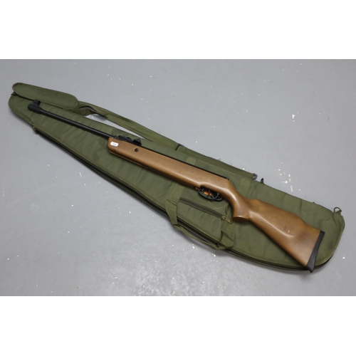 318 - An SMK 19-18 .22 break action air rifle with three quarter length wooden stock Complete with Case (G... 