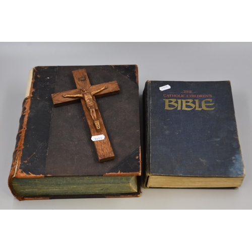 326 - Three Religious Items To Include Antique Leather Bound Bible, The Catholic Children's Bible, And Cru... 