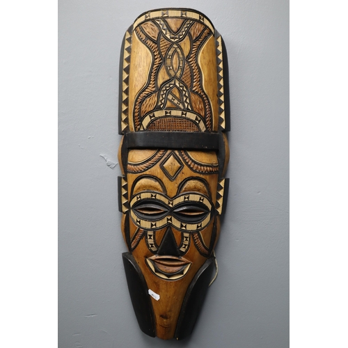 334 - Four Tribal and Aboriginal items, includes 3 Boomerangs and a Large Mask (24”)