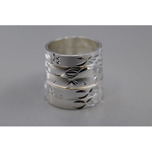 51 - Five 925. Silver Etched Band Rings