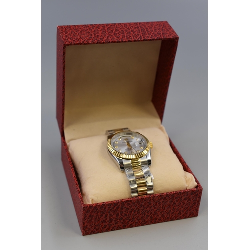 81 - A Silver and Gold Tone Steel Bagelsport Automatic Day/Time Watch, In Presentation Box