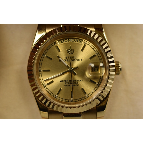 85 - A Gold Tone Automatic Steel Bagelsport Gents Day/Time Watch