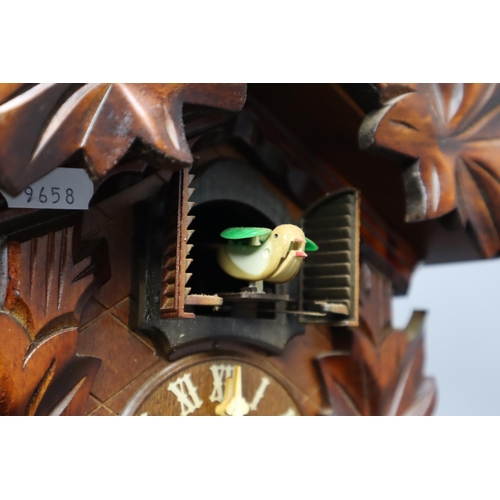 369 - A West German Black Forest F. Mort & Son Cuckoo Clock, (Working) Leaf glued Back on.