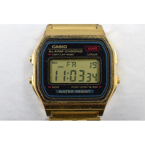 112 - A Gold Tone Casio Digital Alarm Chrono Watch, In Presentation Box