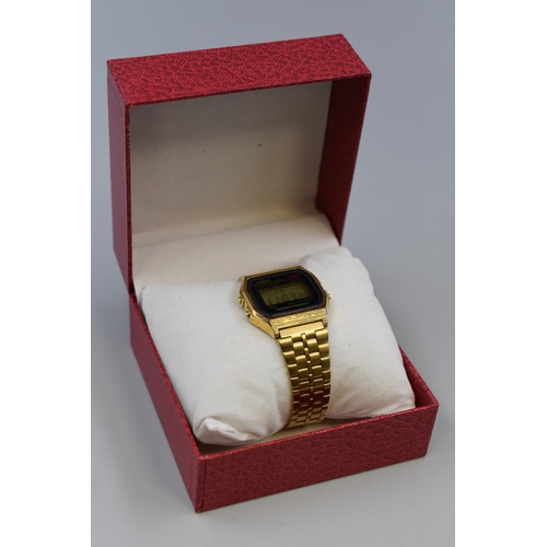 112 - A Gold Tone Casio Digital Alarm Chrono Watch, In Presentation Box