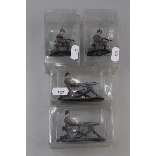 184 - Four Miniature Metal Painted German Schutze Toy Soldier Models in Packaging