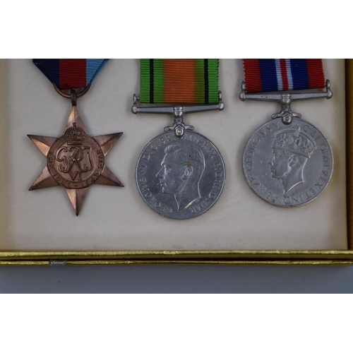 235 - Three WWII Medals to include 1939-1945 Star and War and Defence Medals