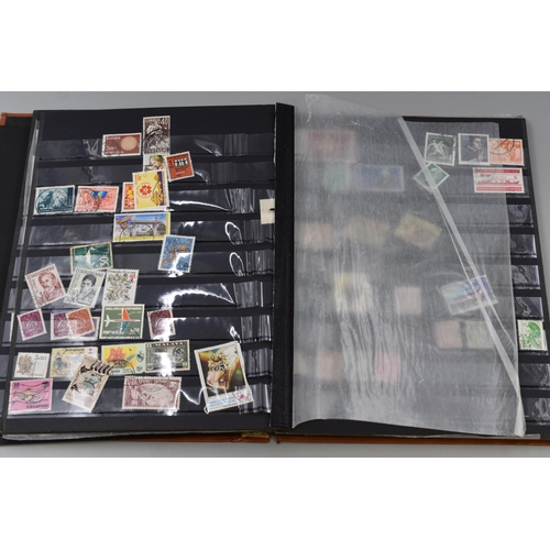 472 - Album Containing a Various Mixed Selection of Worldwide Stamps