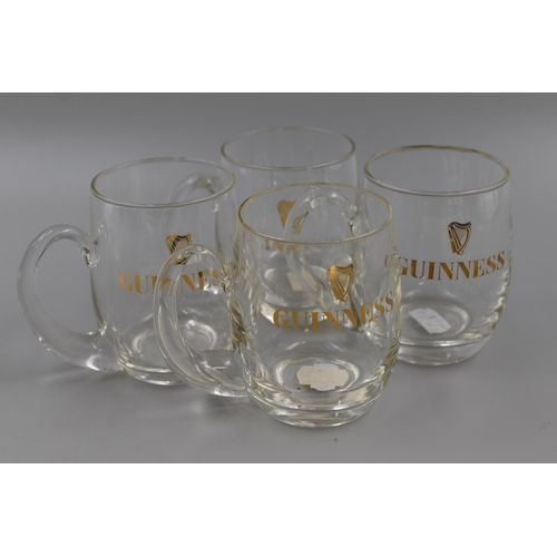 265 - Four Guinness Half Pint Glasses