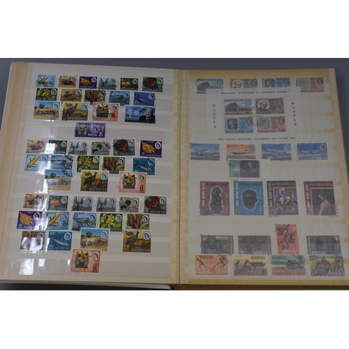 473 - Abria Stock Book containing a Selection of Pictorial Stamps (Rhodesia / Zimbabwe)