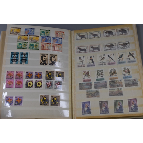 473 - Abria Stock Book containing a Selection of Pictorial Stamps (Rhodesia / Zimbabwe)