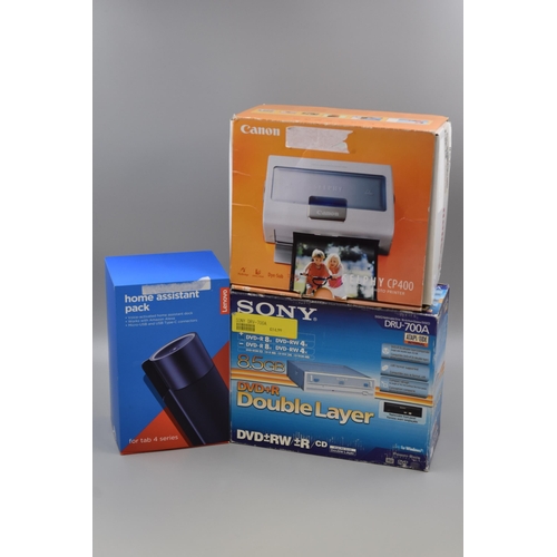 540 - Three Boxed items to include Cannon Mini Printer, Home Assistant Speaker Dock and a Sony DVD R Drive... 