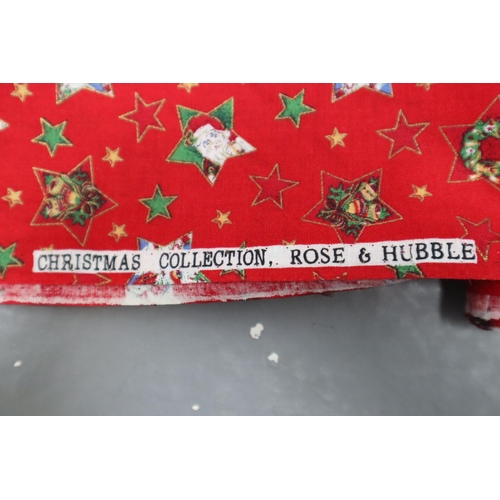 561 - Approx 13mtrs of Red Coloured Christmas Collection Rose and Hubble Patterned Quality Fabric