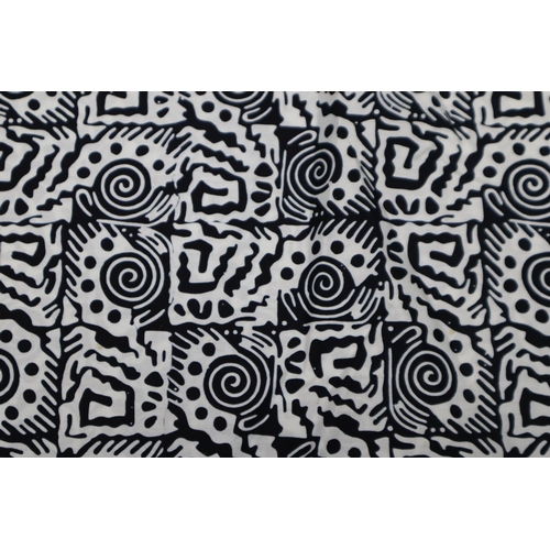 576 - Approx 13mtrs of Black and White Coloured Tonga Patterned Quality Fabric