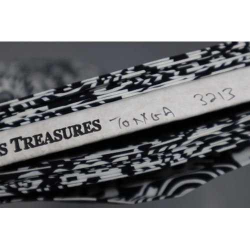 576 - Approx 13mtrs of Black and White Coloured Tonga Patterned Quality Fabric