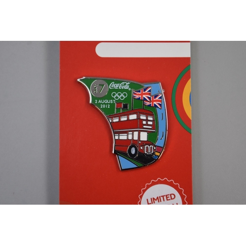 621 - Thirteen Boxes of Ten Coca Cola Limited Edition Olympics Day Badges for Various Days