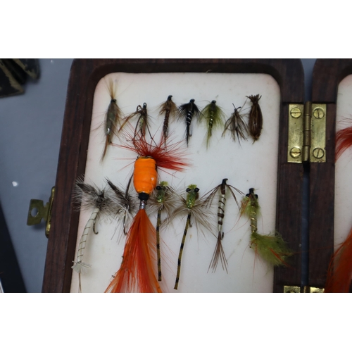 744 - Fly Fishing Lot - Includes Flys in Cases, Orvis Reel, and a selection of Lines in Carry Bag