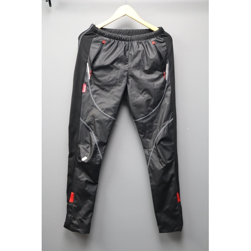 751 - Crane Size 42 Cycling Jacket, Pair of Santic Trousers (Size M) and a Trespass Cycle Helmet