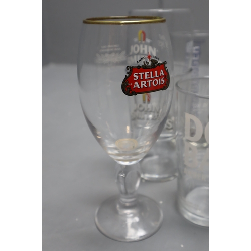 853 - Large Selection of Named Pint Glasses, includes Doom Bar, Inches, John Smith’s Whitbreads, Goo... 