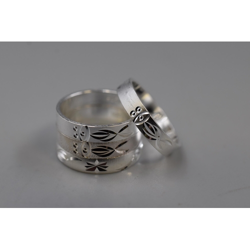 98 - Four Etched 925. Silver Band Rings