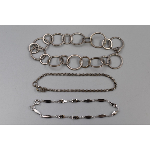 101 - Three Sterling Silver Bracelets. Includes Interlocking Circles, Belcher Chain and Other