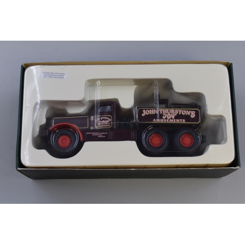 141 - Four new boxed die cast model vehicles to include showman's truck 6