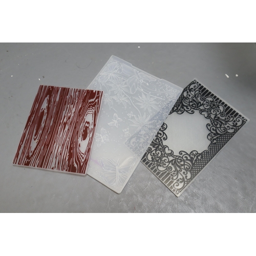 368 - Large quantity of embossing plates for card crafting plus card blanks, envelopes and more