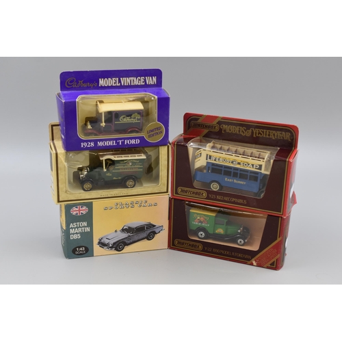 161 - Five Boxed Model Vehicles to include Matchbox, Cadbury, Aston Martin and Other