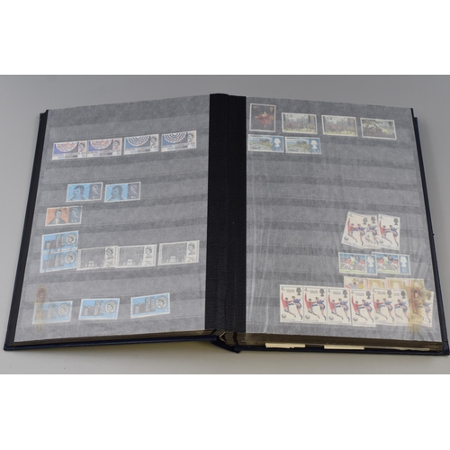 384 - Album containing a selection of British Stamps, includes Mint