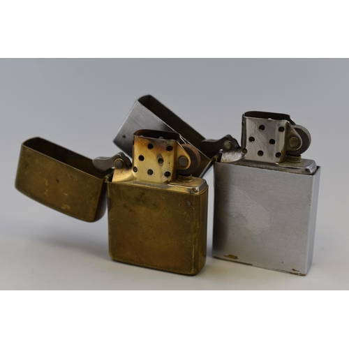 171 - Two Collectable Zippo Lighters, Includes Brass and Silver Tone. Both Spark