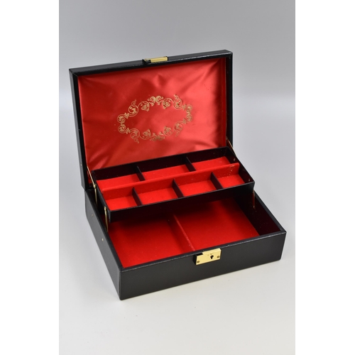 386 - A Faux Black Leather 'By Appointment To The Royal Swedish Court' Jewellery Box