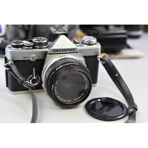 191 - Olympus OM-2 SLR 35mm Camera with a 75mm to 150mm Zoom Lens, Flash Unit and Case