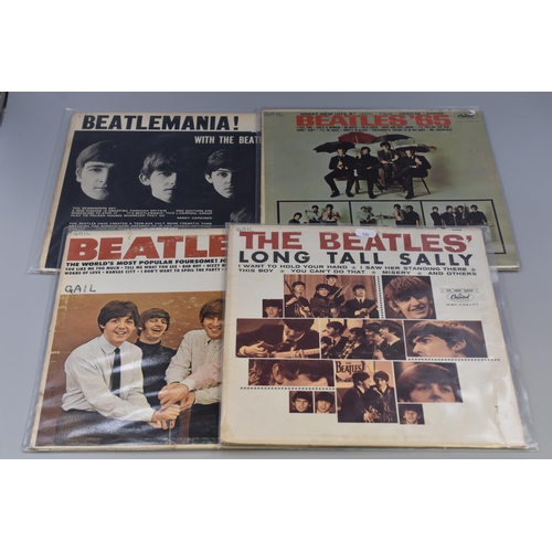 438 - Four Beatles albms, to include, Long tall sally, Beatles VI, Beatles 65 and Batlemaina on Capitol re... 