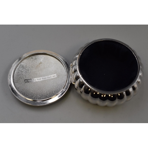 228 - Two Decorative itemes to include a Enamel Lidded Silver Effect Trinket Box and a Silver Effect Eleph... 