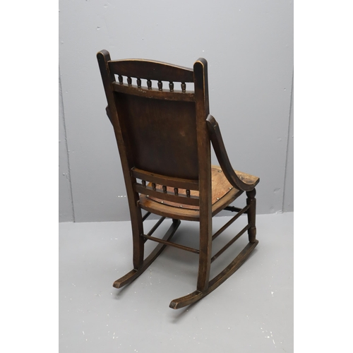 534 - Antique Oak Rocking Chair with Sloping Arms and Inlaid Studded Decorative Panels (Height 40