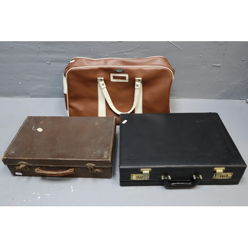 520 - A small brown vintage suitcase 16