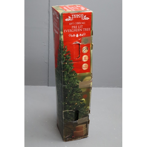 563 - Boxed 6ft Pre Lit Evergreen Christmas Tree complete with power lead Lights Up and Working fine and c... 