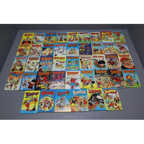 733 - A Large Selection of Vintage Annuals To Include Dandy, Beano, Topper, And More