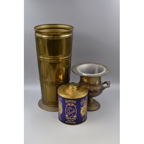 651 - Brass Umbrella Stand, Cadburys Biscuit Barrel and Silverplated Trophy Vase