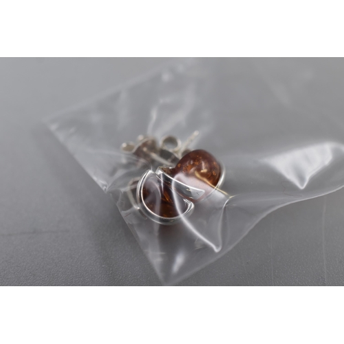 58 - Three Pairs of Silver 925 Amber Earrings