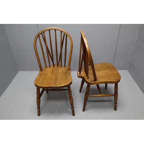 609 - An Oak Dining Table With A Set of Four Spindle Backed Dining Chairs. Table Is Approx 26