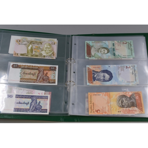 195 - Album Containing a Large Selection of Uncirculated Worldwide Bank Notes. Includes Syria, Pakistan, Z... 