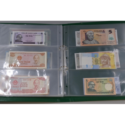 195 - Album Containing a Large Selection of Uncirculated Worldwide Bank Notes. Includes Syria, Pakistan, Z... 