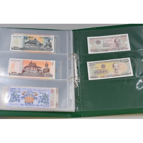 195 - Album Containing a Large Selection of Uncirculated Worldwide Bank Notes. Includes Syria, Pakistan, Z... 