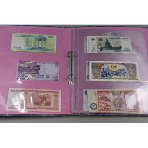 196 - Folder to include Uncirculated Worldwide Banknotes. Includes Malawi, Iran, Ballarus, Nepal, Vietnam,... 