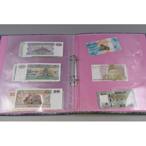 196 - Folder to include Uncirculated Worldwide Banknotes. Includes Malawi, Iran, Ballarus, Nepal, Vietnam,... 