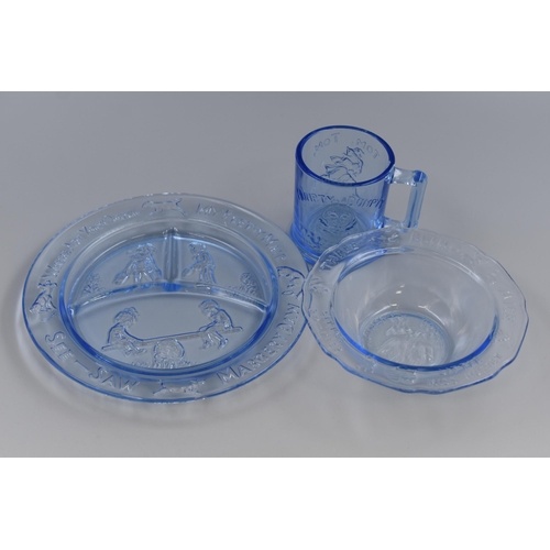 206 - A Three Piece Blue Glass Nursery Rhyme Children's Dinner Set