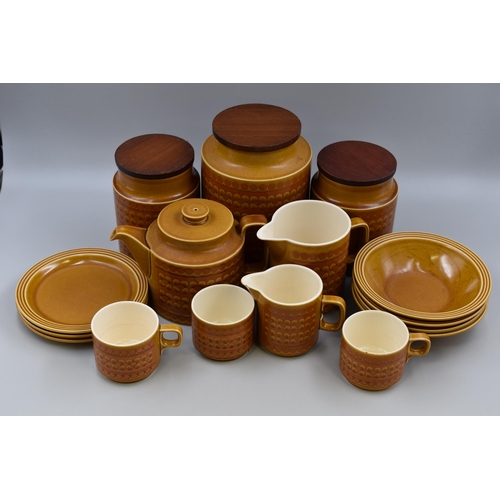 317 - Sixteen Pieces of Hornsea Saffron, Includes Cups, Side Plates, Kitchen Containers, And More. Some Pi... 